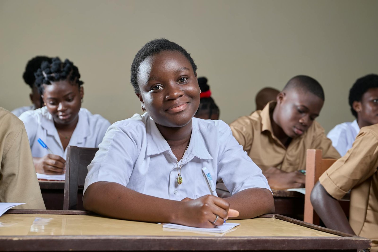diverse classroom of focused students learning